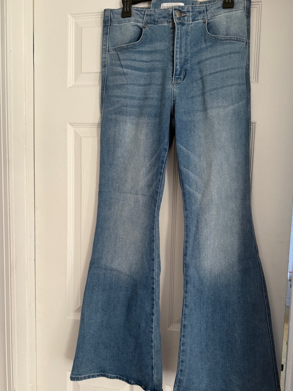 Fashion Nova Light Blue High-Rise Flare Jeans with Lace Up Back Detail